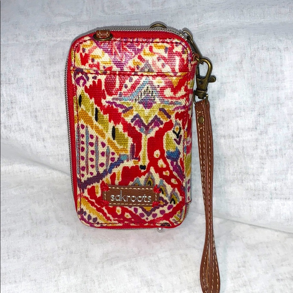 Sakroots Wristlet smartphone holder wallet.